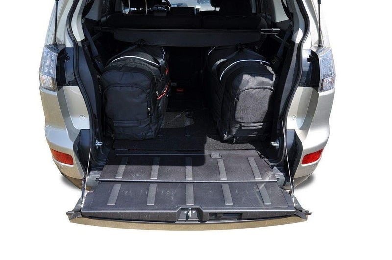 Kjust reistassenset geschikt voor Mitsubishi Outlander (II) (2007-2013)