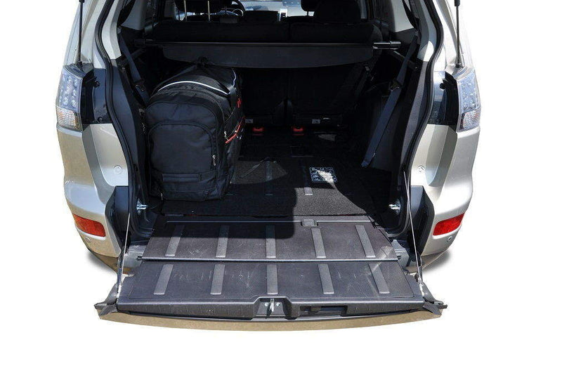 Kjust reistassenset geschikt voor Mitsubishi Outlander (II) (2007-2013)